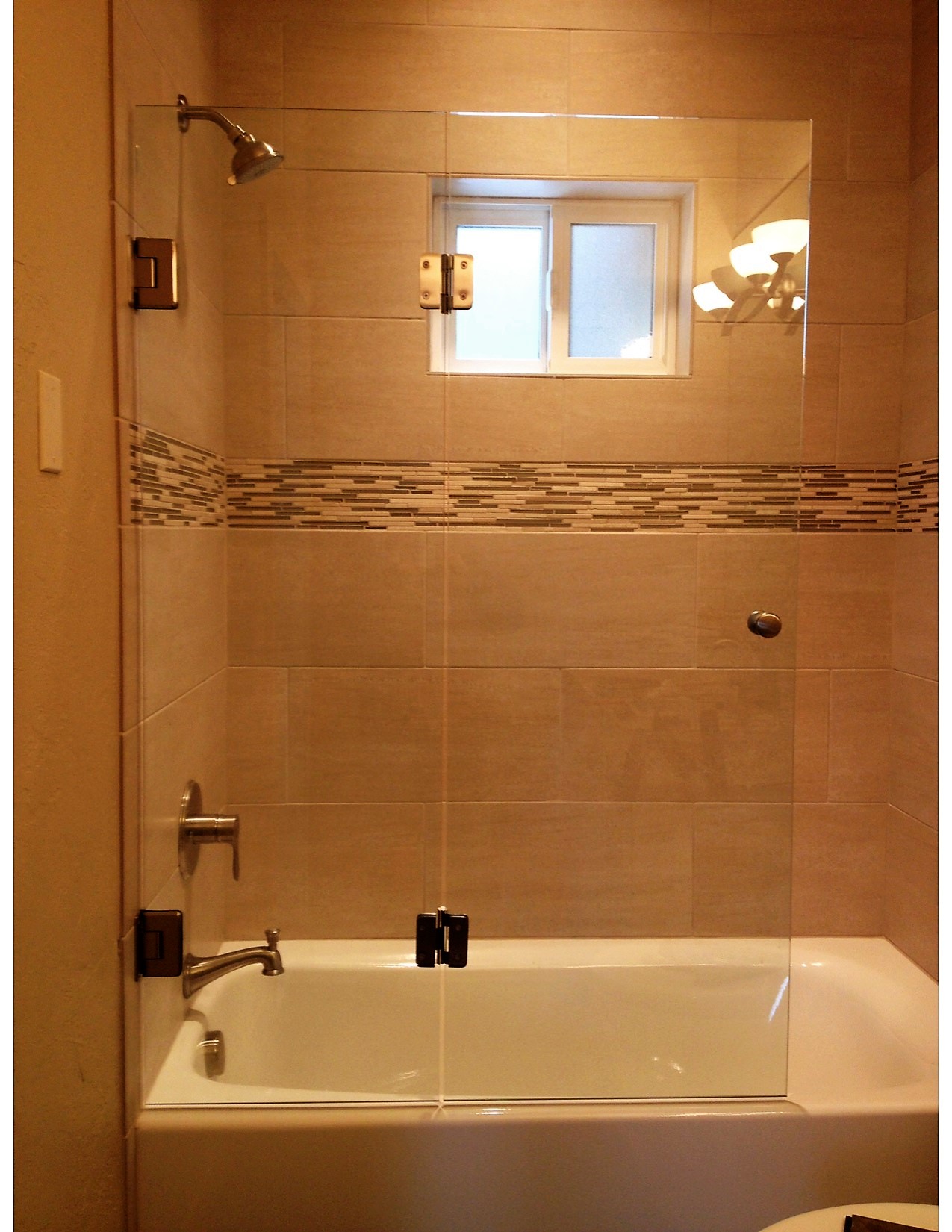 bi-fold glass shower doors installed in bend oregon