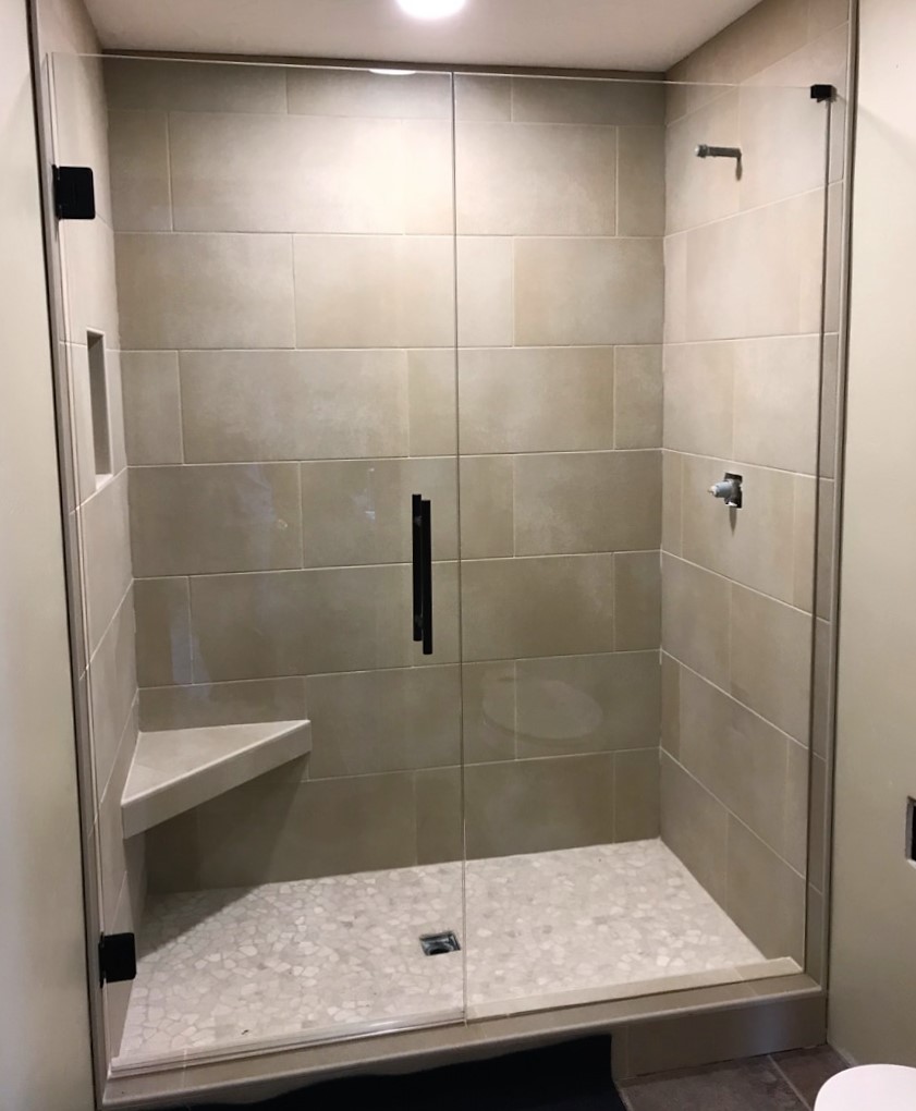 glass shower door with stationary panel installation in bend, oregon